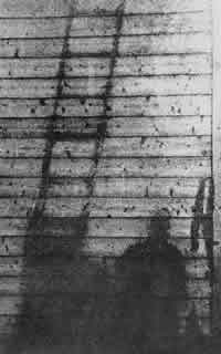 Shadow of person and ladder burned into wall after Nagasaki bombing